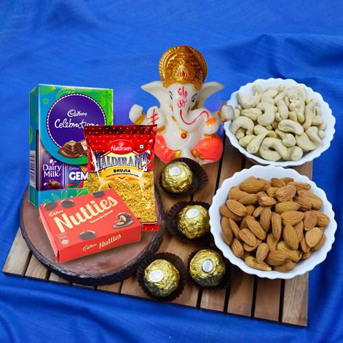 Enticing Ganpati Idol with Dry Fruits Chocolates n Snacks