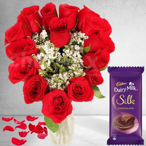 Spectacular Display of Heart Shape Red Roses in Vase with Cadbury Silk