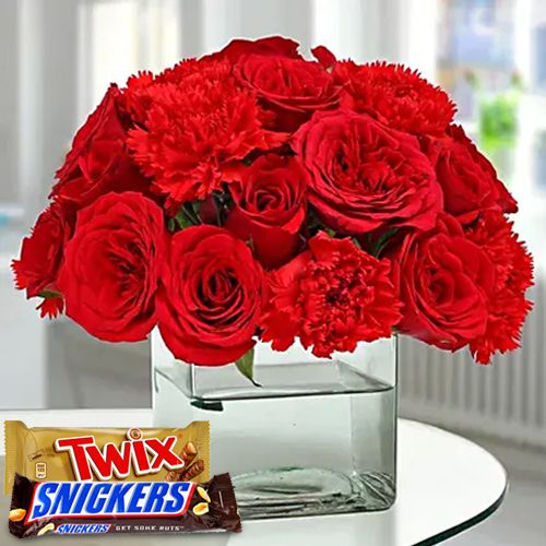 Radiant Redness of Roses n Carnations in Vase with Snickers n Twix