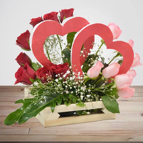 Spectacular Basket Arrangement of Mixed Roses with Twin Heart Prop