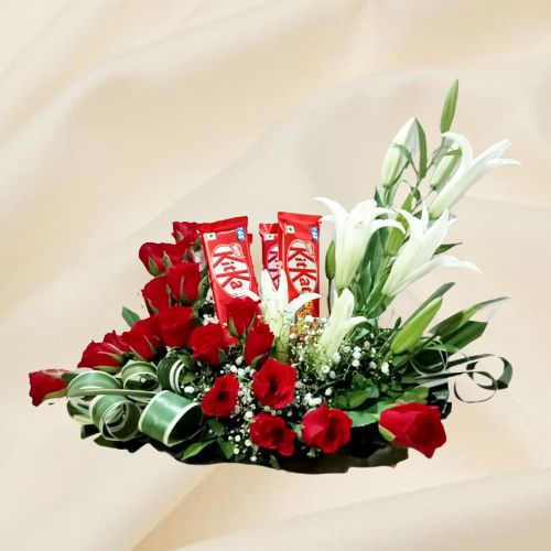 Gorgeous Flower Arrangement of Red Roses with White Lily Stems N KitKat