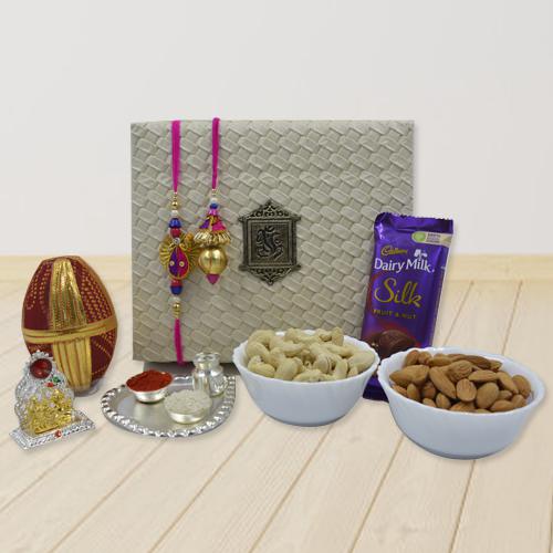 Trendy Bhaiya Bhabhi Rakhi with Pooja Items Dry Fruits n Cadbury Silk