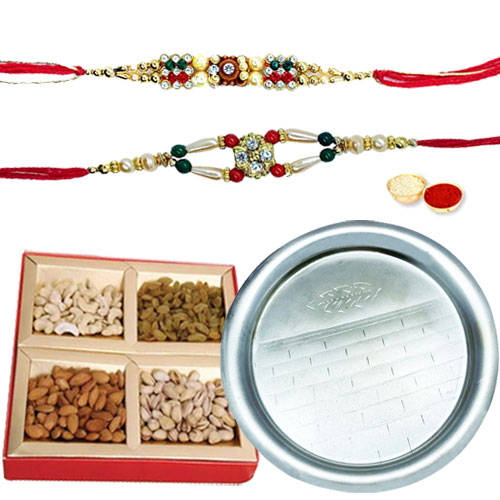 Flattering Gift Set of Pooja Thali N Assorted Dry Fruits with 2 free Rakhi Roli Tilak and Chawal for your Precious Brother on the Occasion of Rakhi