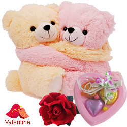 Cute Hugging Couple Teddy with 1 Velvet Rose and 3 pcs Heart Homemade Chocolate